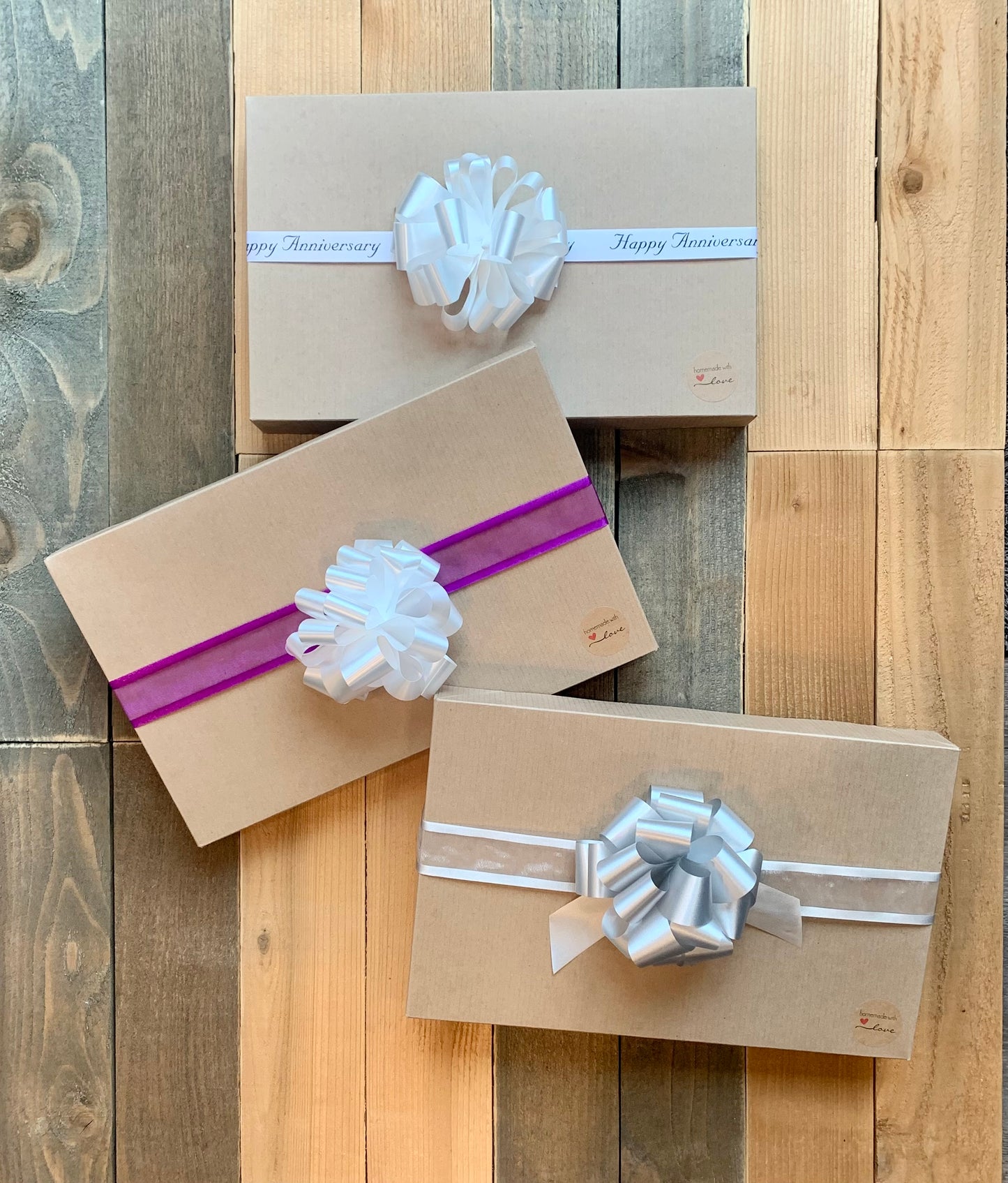 anniversary ribbon gift wrap happy anniversary, with white bow, purple ribbon with white bow, silver ribbon with silver bow
