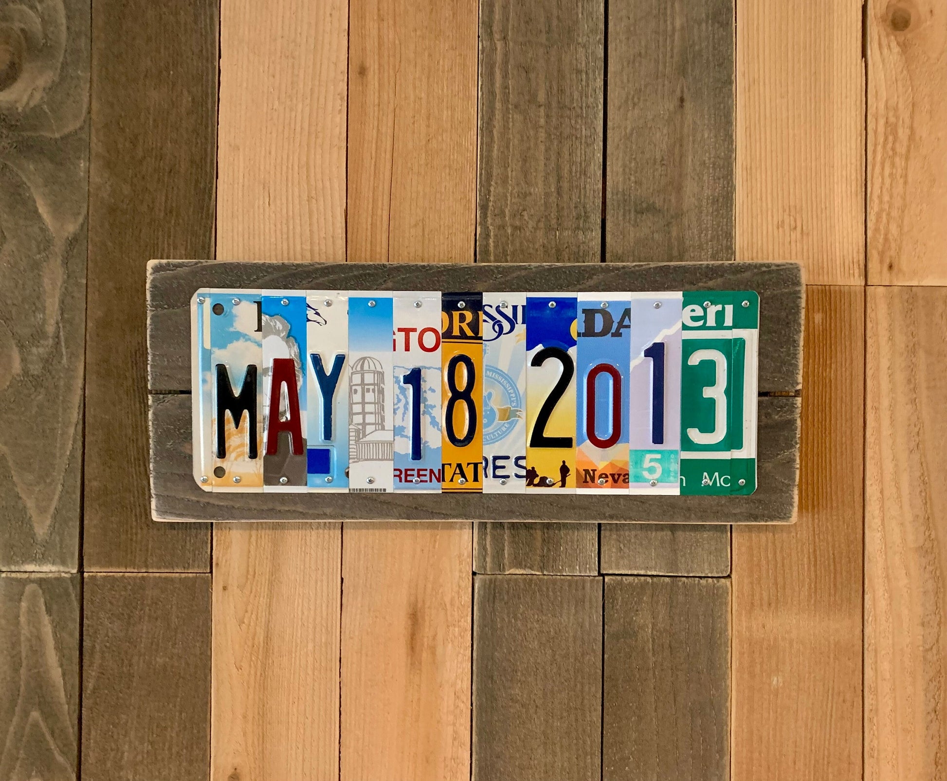 Colorful license plates!  We have developed relationships with many sources and are continually buying plates that are in good condition, have great color, and plenty of graphical interest.  We incorporate both embossed and flat style license plates which allows us to accommodate custom state request for states that switched to the newer style of plate years ago.