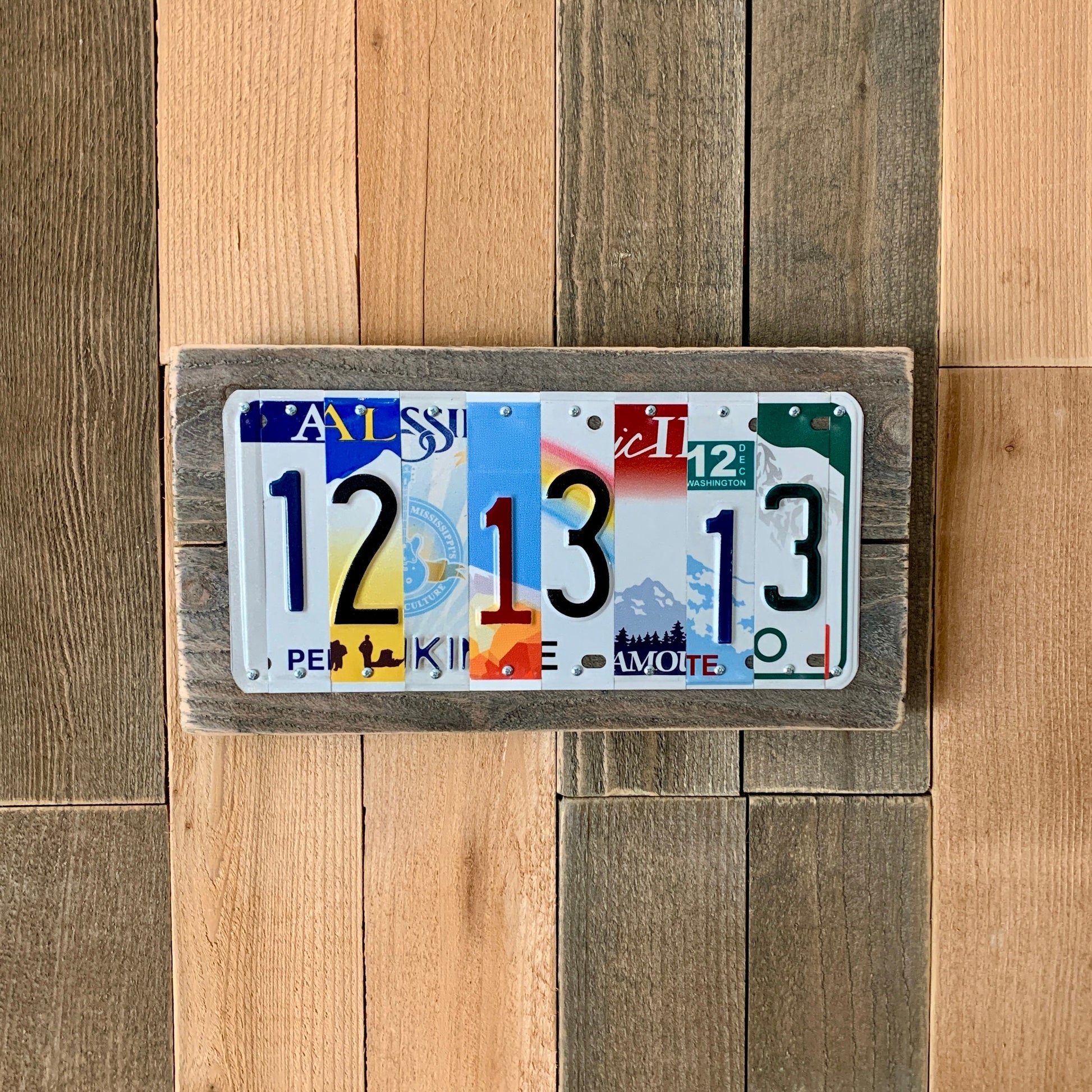 US license plates are cut into individual pieces to make custom wedding date, tenth anniversary traditional aluminum gift