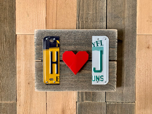 handmade genuine license plate initials with folded red heart in the center